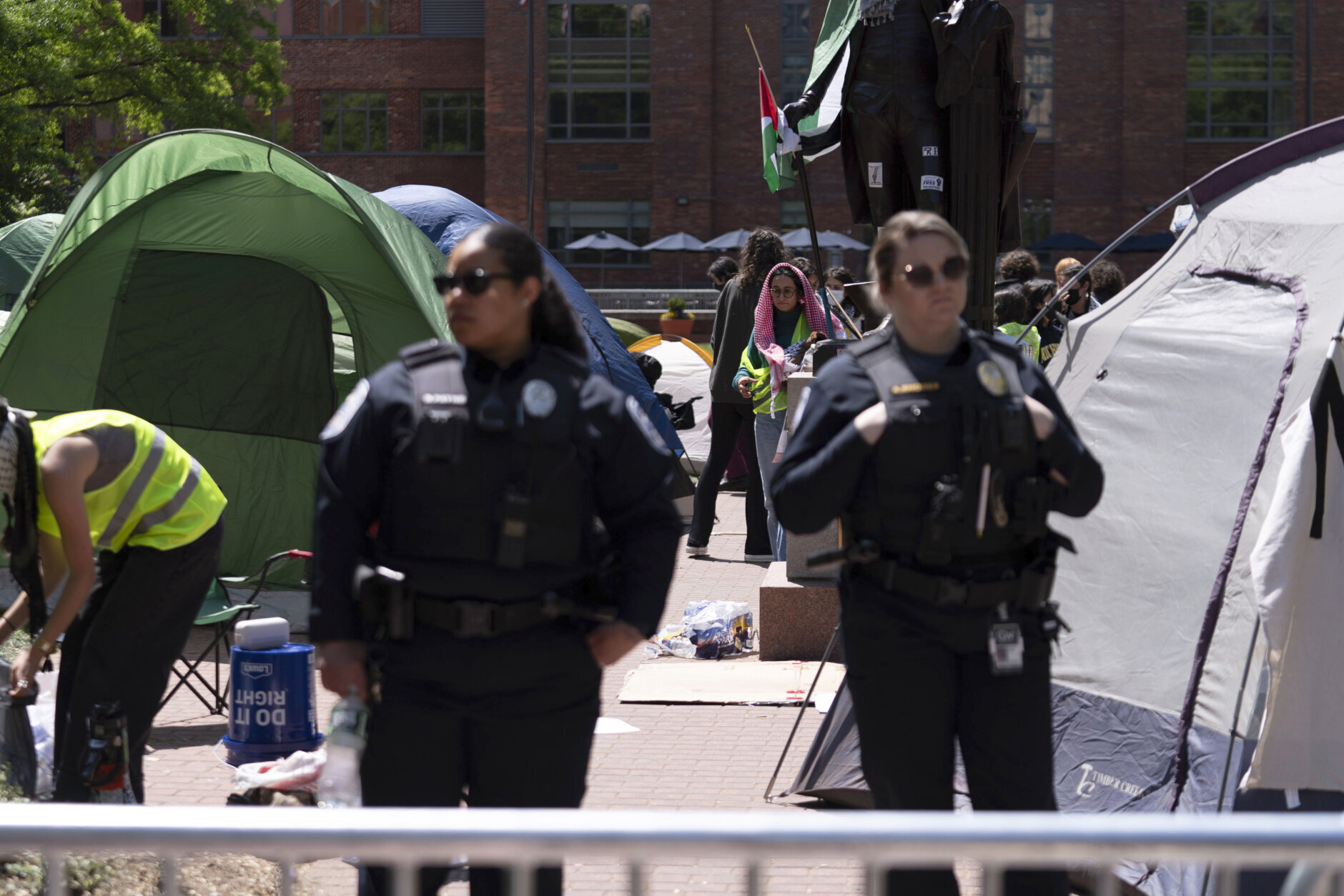 George Washington University police close a student encampment as students demonstrate during a pro-Palestinian protest over the Israel-Hamas war on Friday, April 26, 2024, in Washington. (AP Photo/Jose Luis Magana)